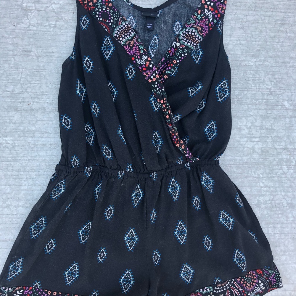 Black romper with super cute designs!